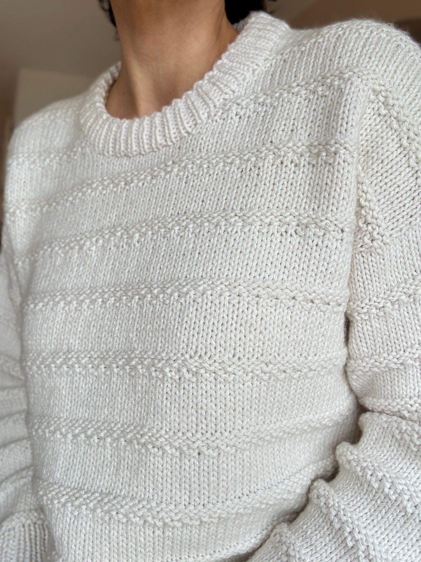Close-up of The Artist’s Sweater in cream