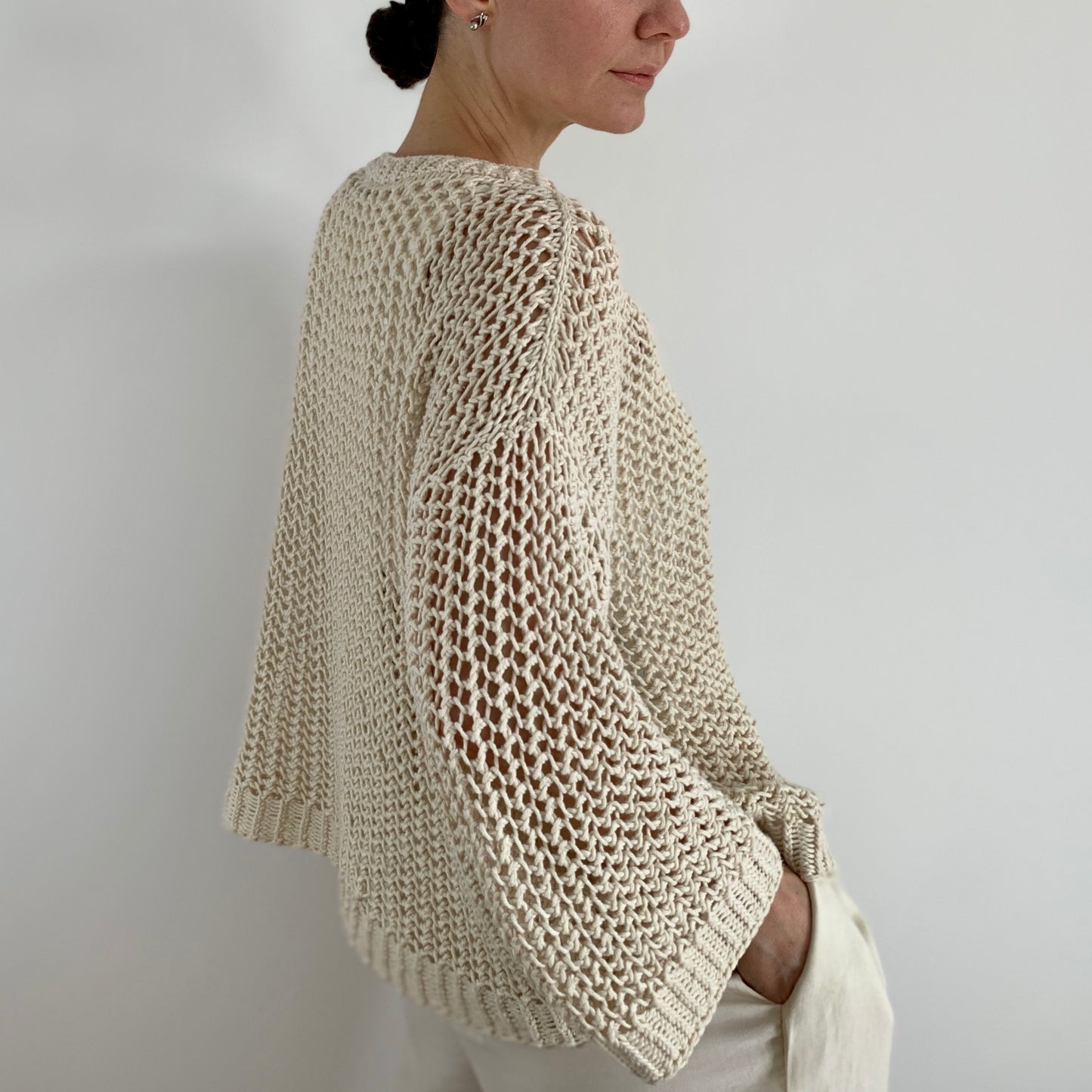 Side view of a woman wearing the Halycon Lace Sweater