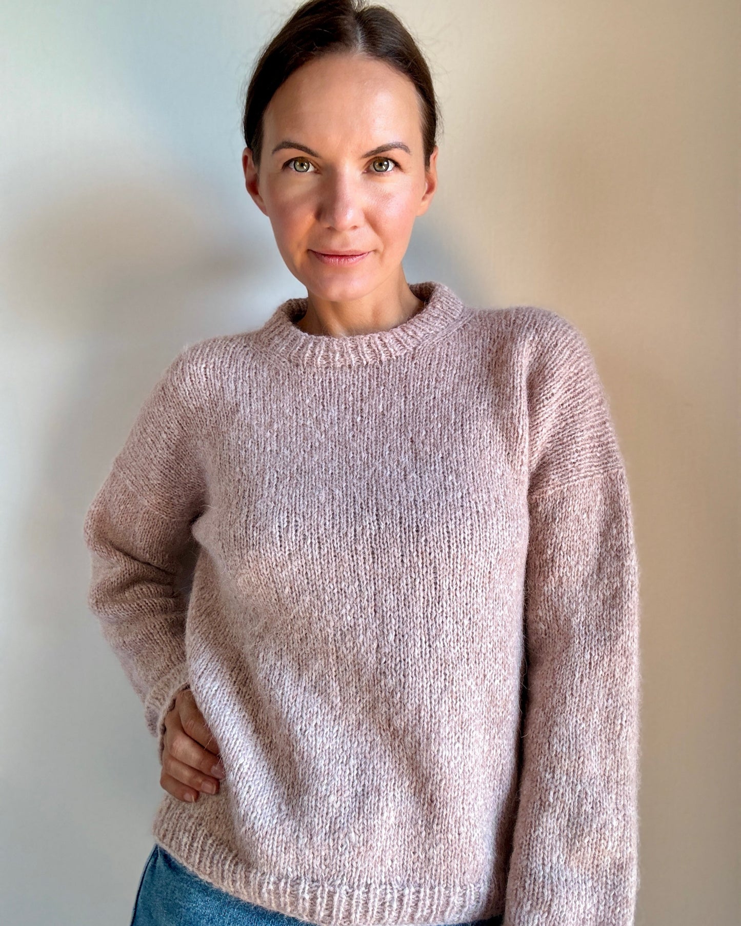 Julia Piro wearing the Drop in Dream sweater in pink.
