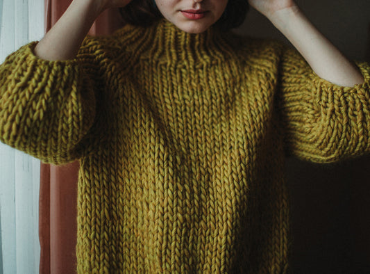 3 Chunky sweaters that will make you feel delicately fragile.