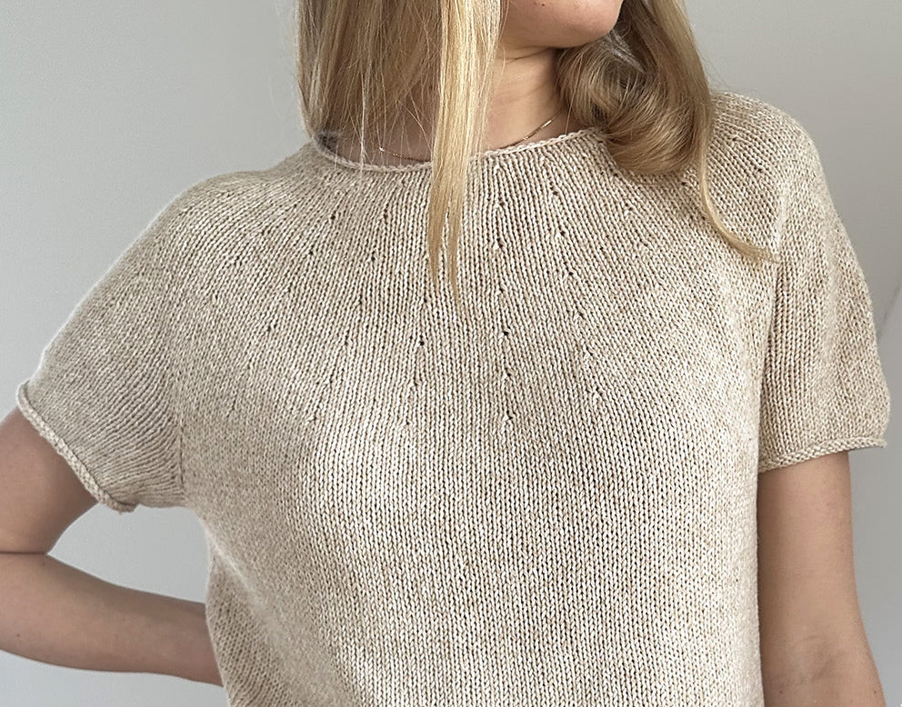 Sleeve-shortening guide for top-down sweaters.